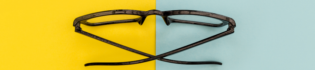 bifocal glasses on two tone background