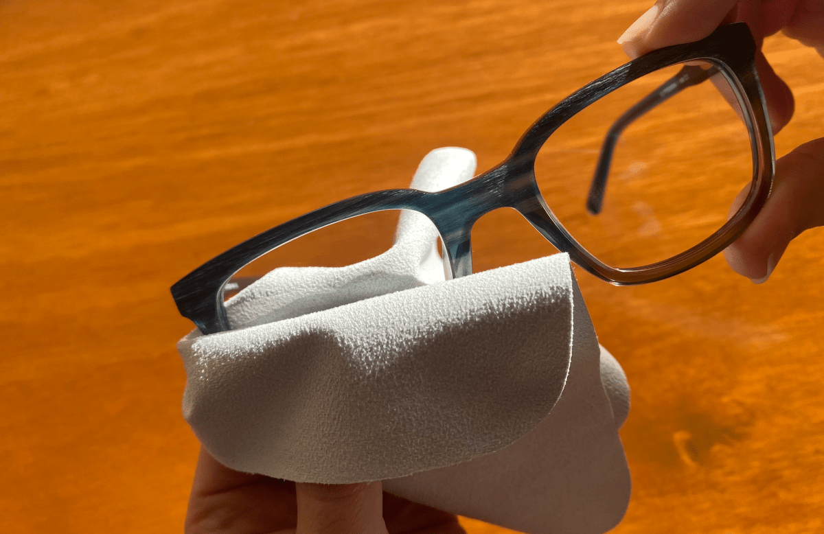 a photo of cleaning glasses with cloths