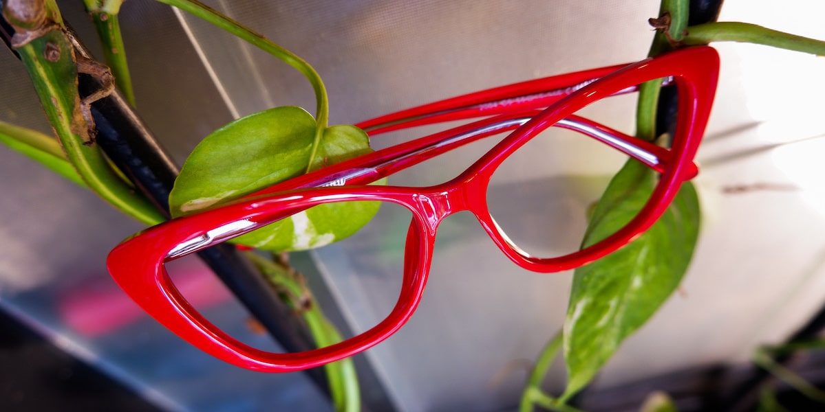 red glasses with cat eye frame