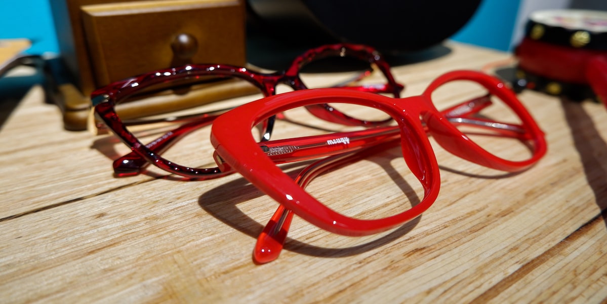 red glasses with cat eye frames