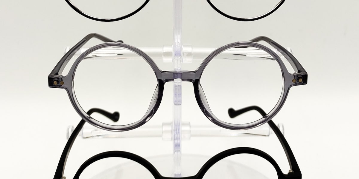 round glasses frame on a rack