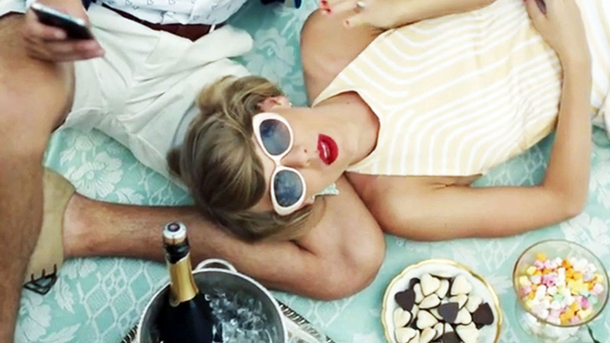 Taylor Swift wearing cat eye glasses in her Blank Space music video
