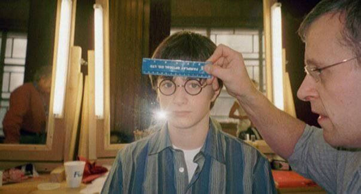Daniel Radcliffe tries on custom glasses by William Luff
