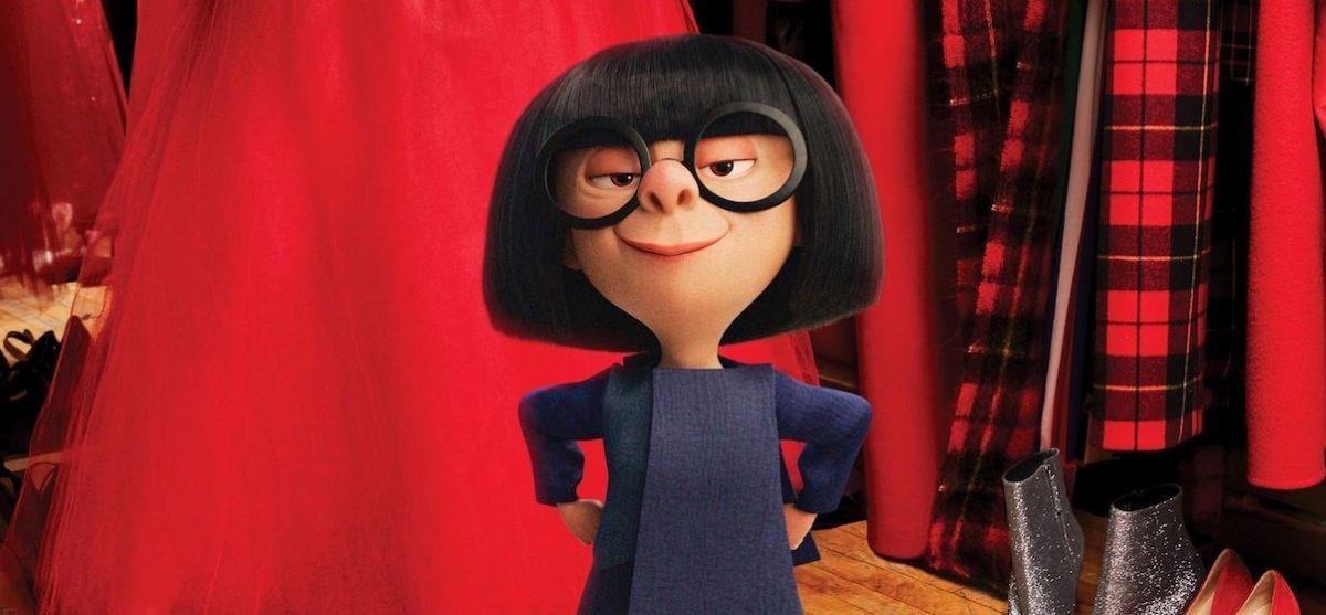 edna in thick black round glasses