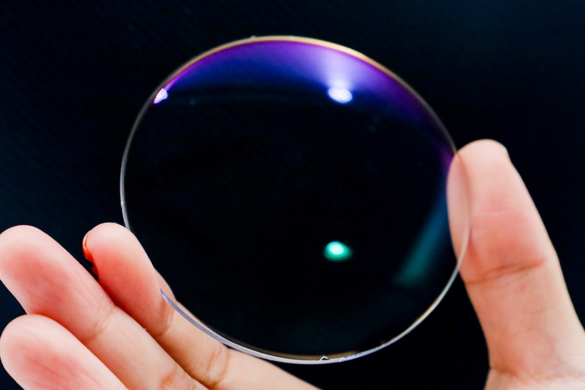 a piece of prescription lens with blue light filtering property