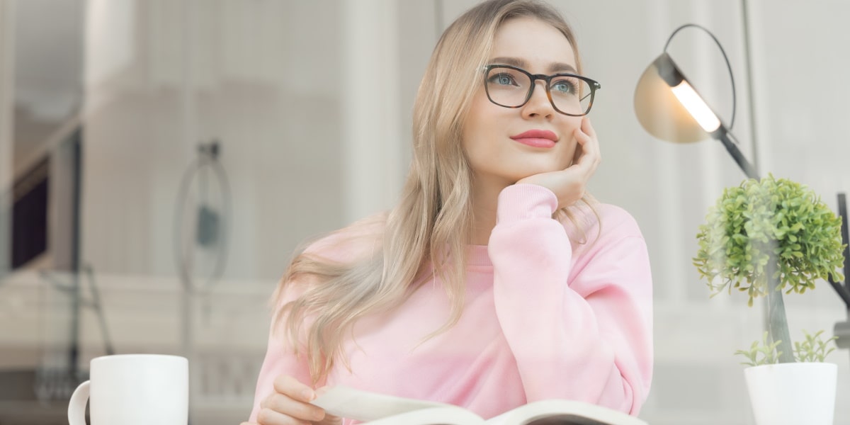 woman wearing a pair of bifocals looking into the distance