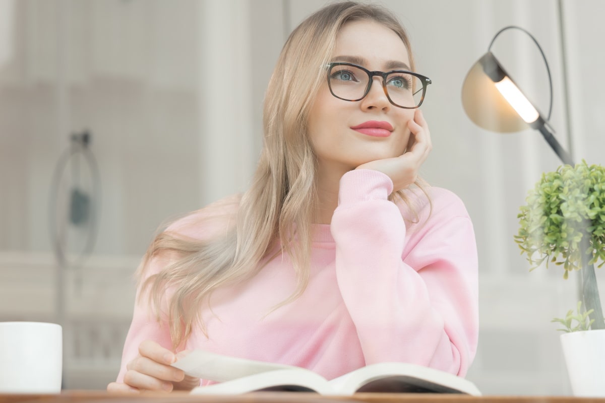 woman wearing a pair of bifocals looking into the distance