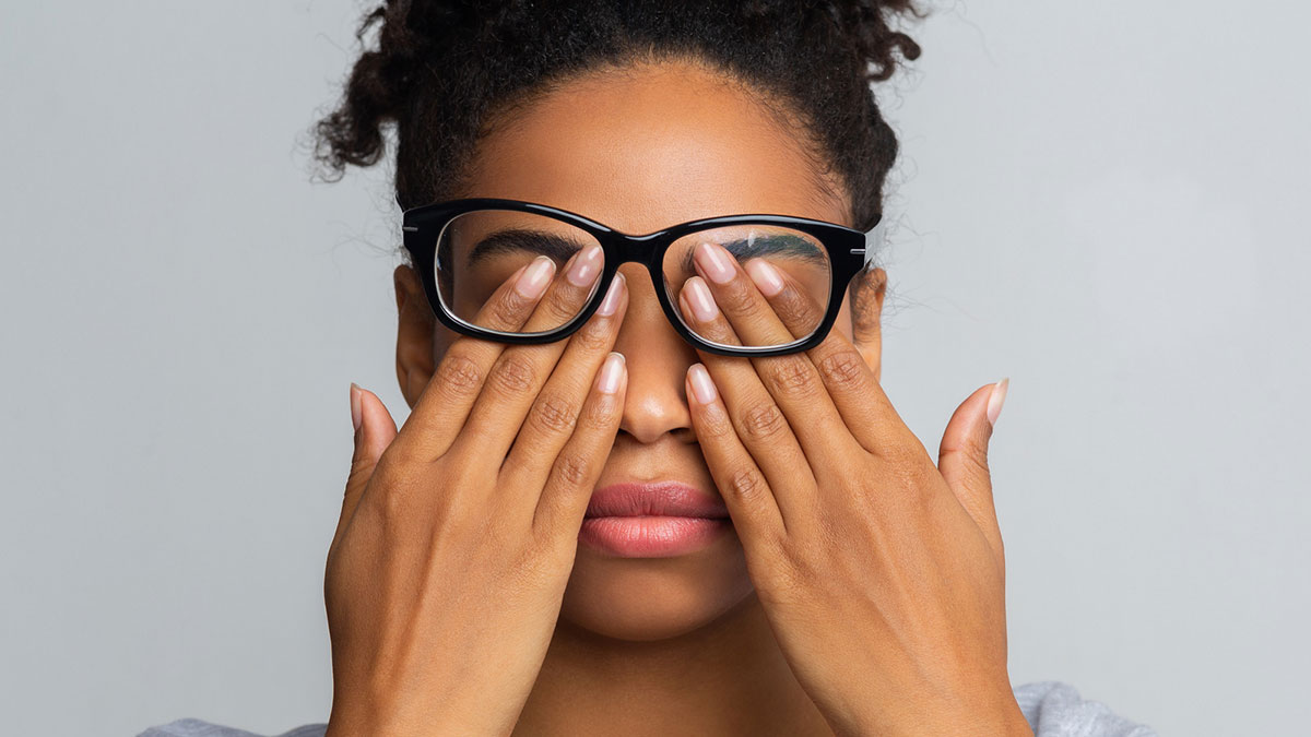 Woman having allergic reaction when wearing glasses