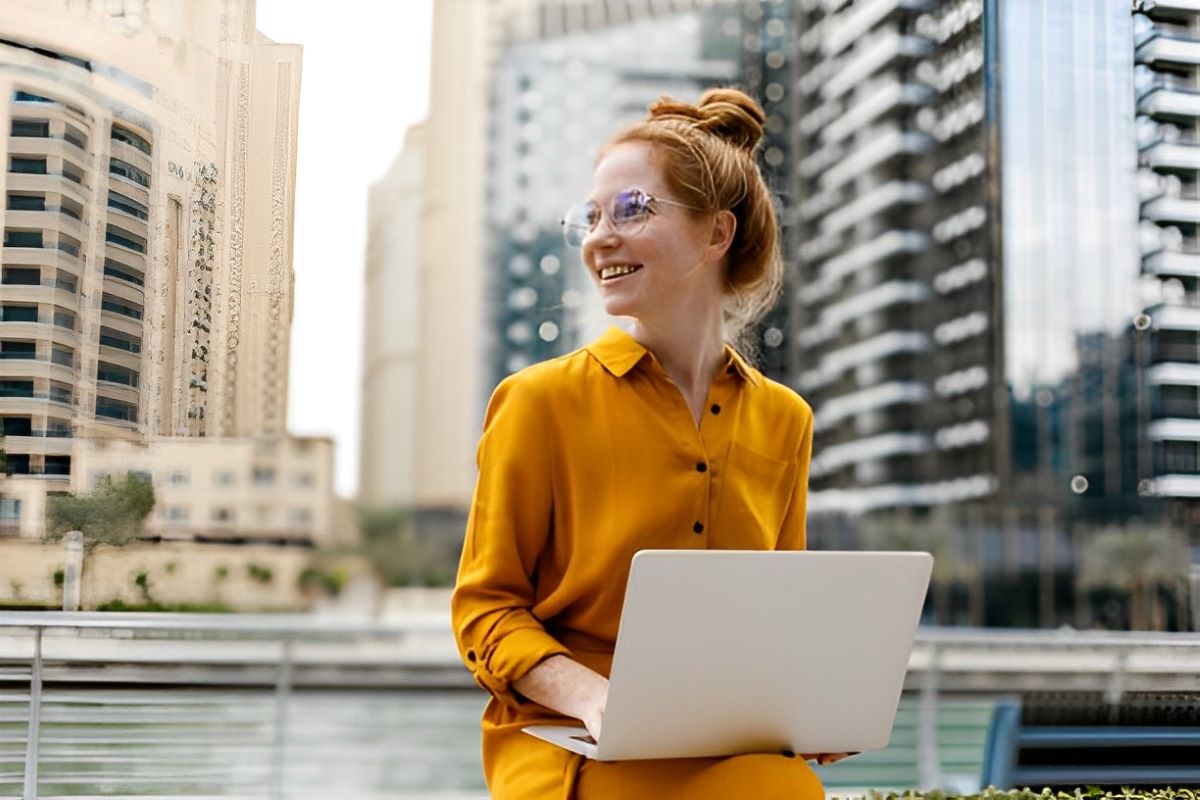 woman wearing a pair of rimless glasses with polished lenses