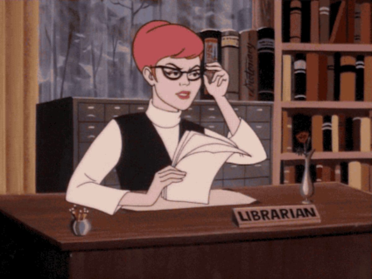 barbara gordon in retro cat eye glasses for the librarian look