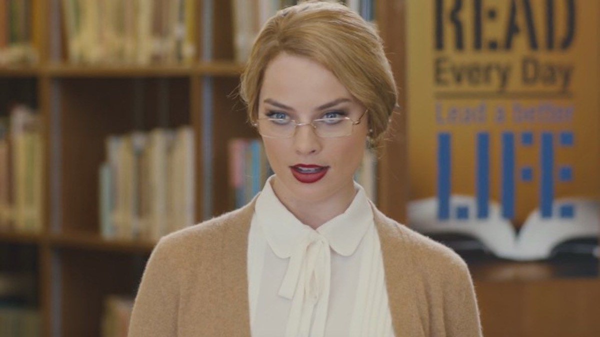 margot robbie with a pair of glasses for the libarian look in an snl skit