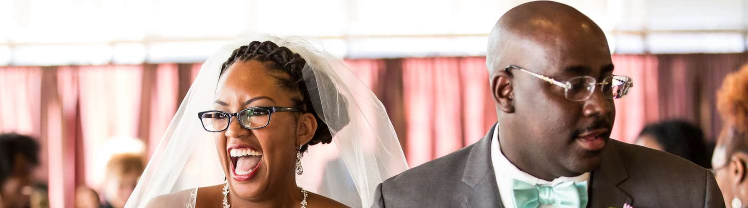 a pair of wedding couple wearing eyeglasses