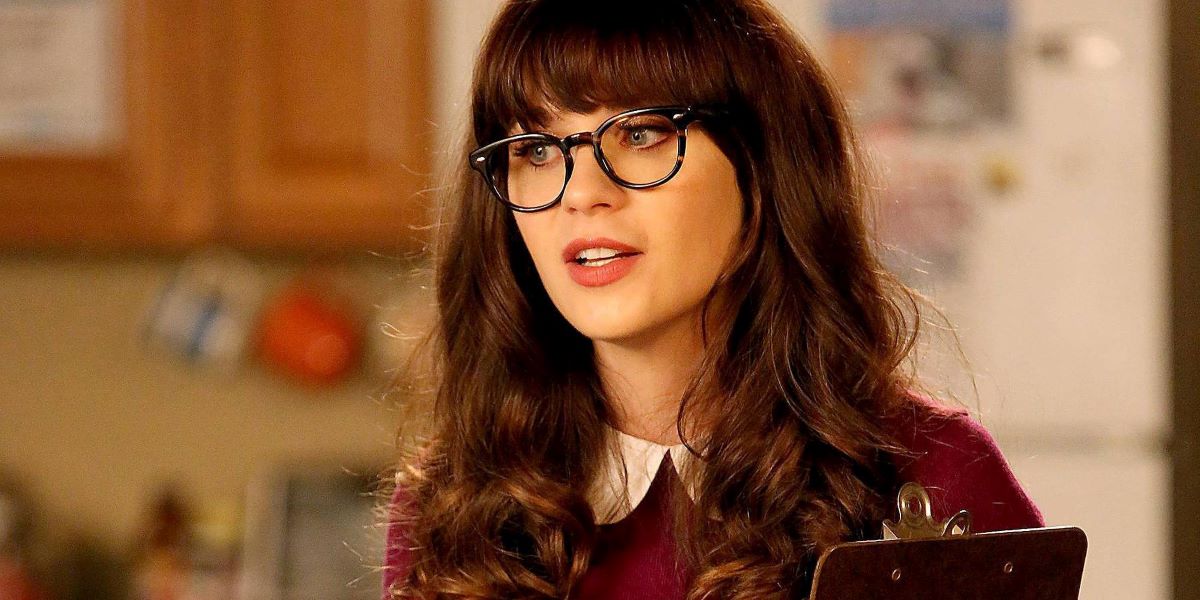 zooey deschanel in librarian getup as jessica day