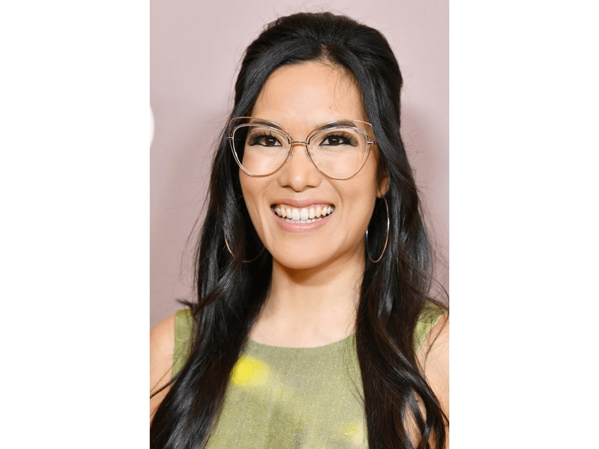 ali wong wearing a pair of clear cat eye glasses frame