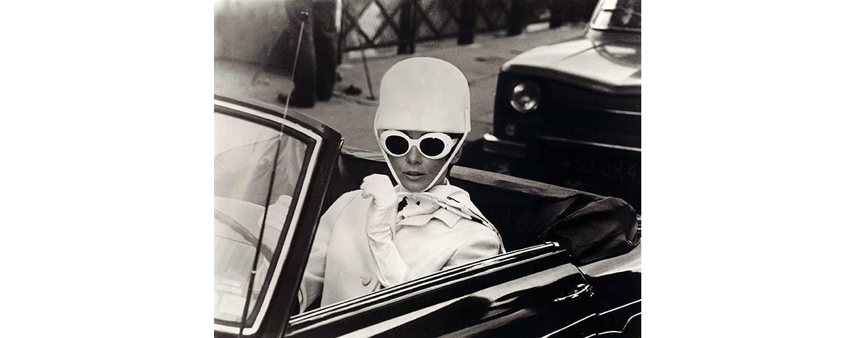 Audrey Hepburn wearing a pair of oversized sunglasses in How to Steal a Million