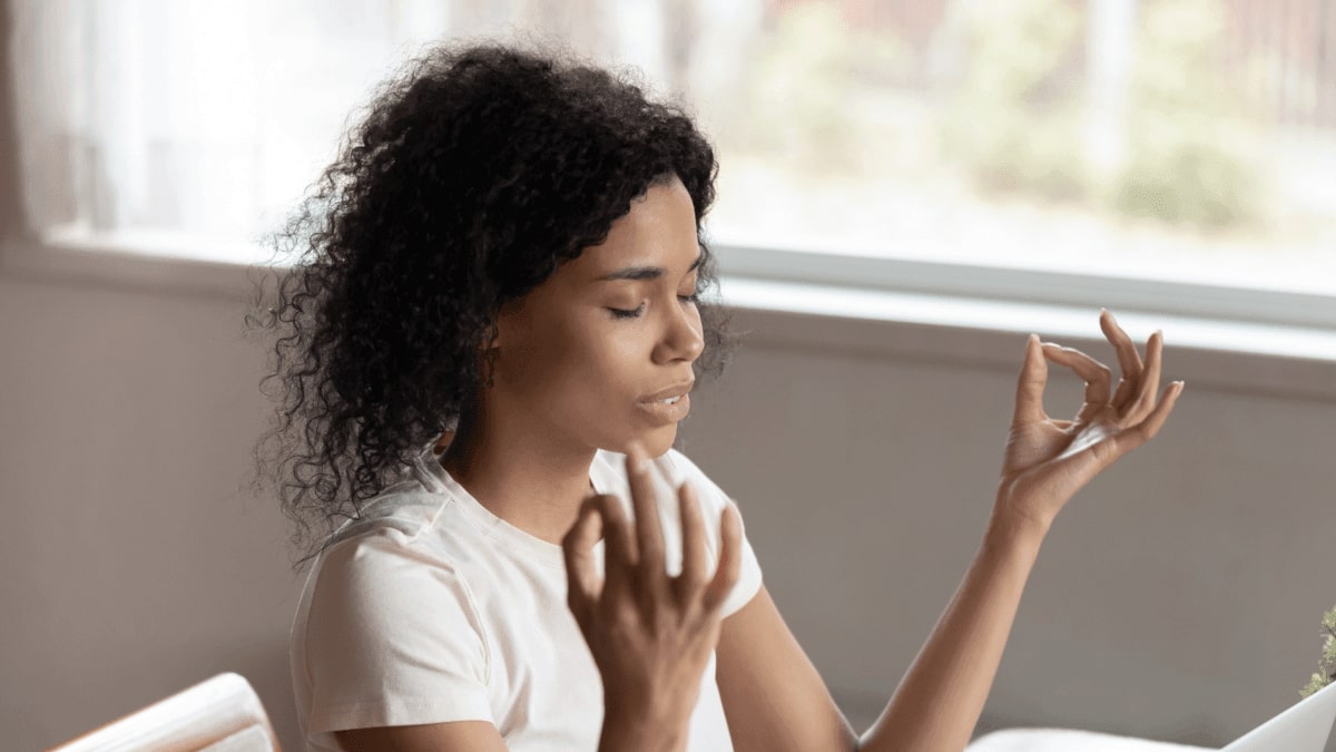 a woman performing blink break exercise