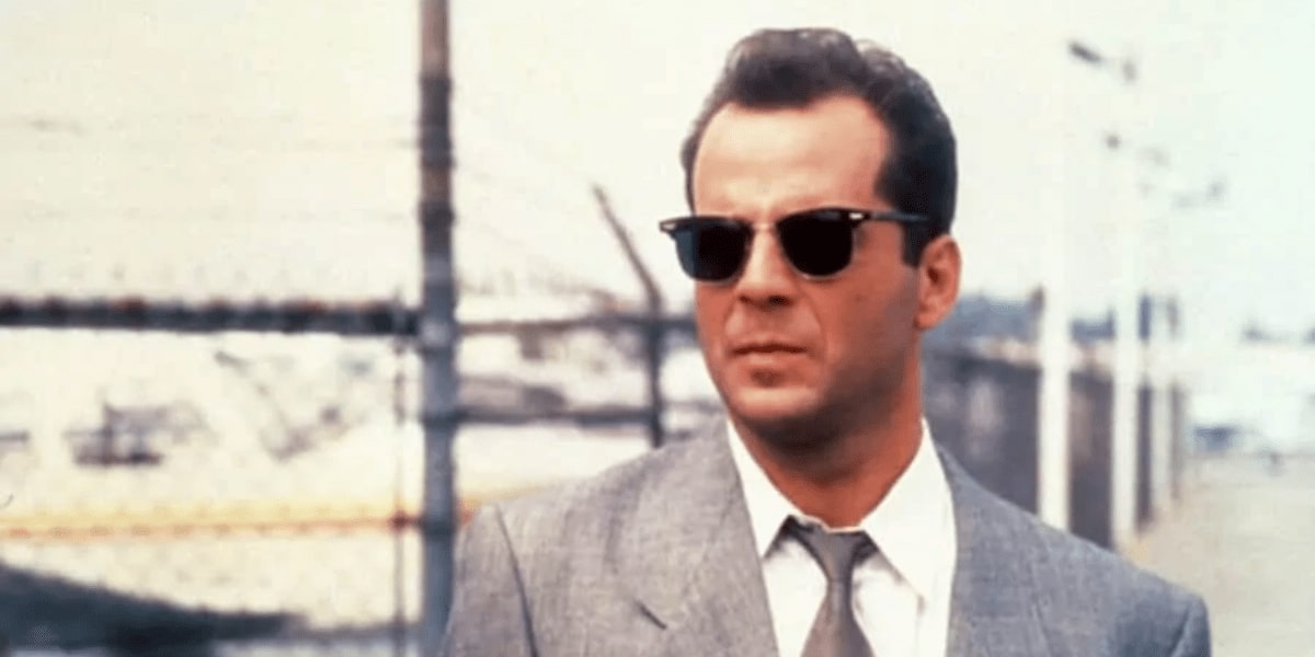 bruce willis wearing a pair browline sunglasses in suit