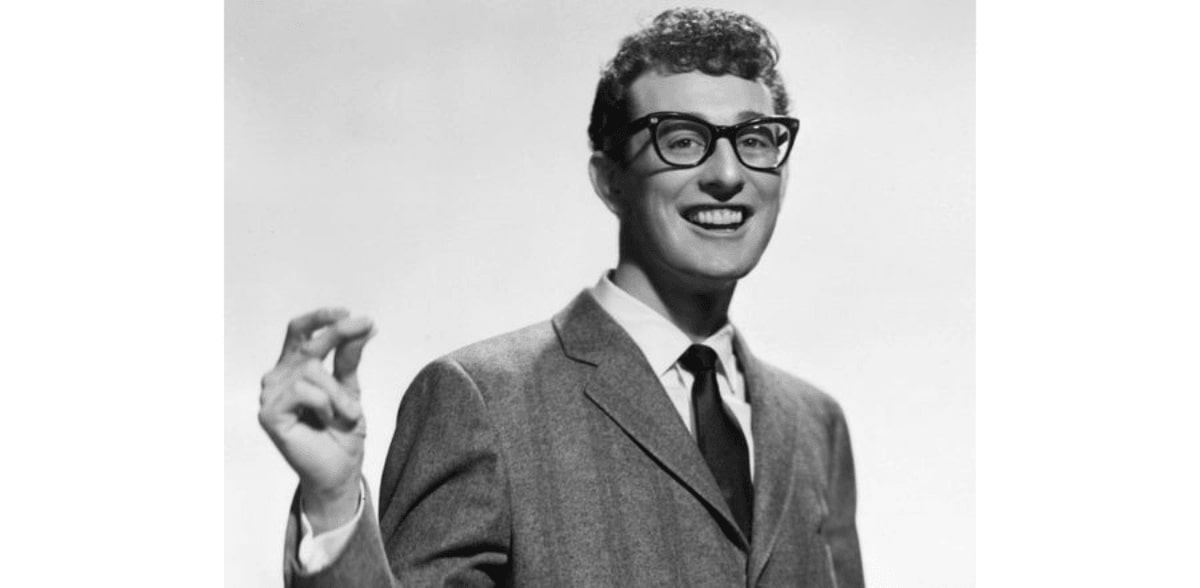 buddy holly wearing his pair of signature eyeglasses