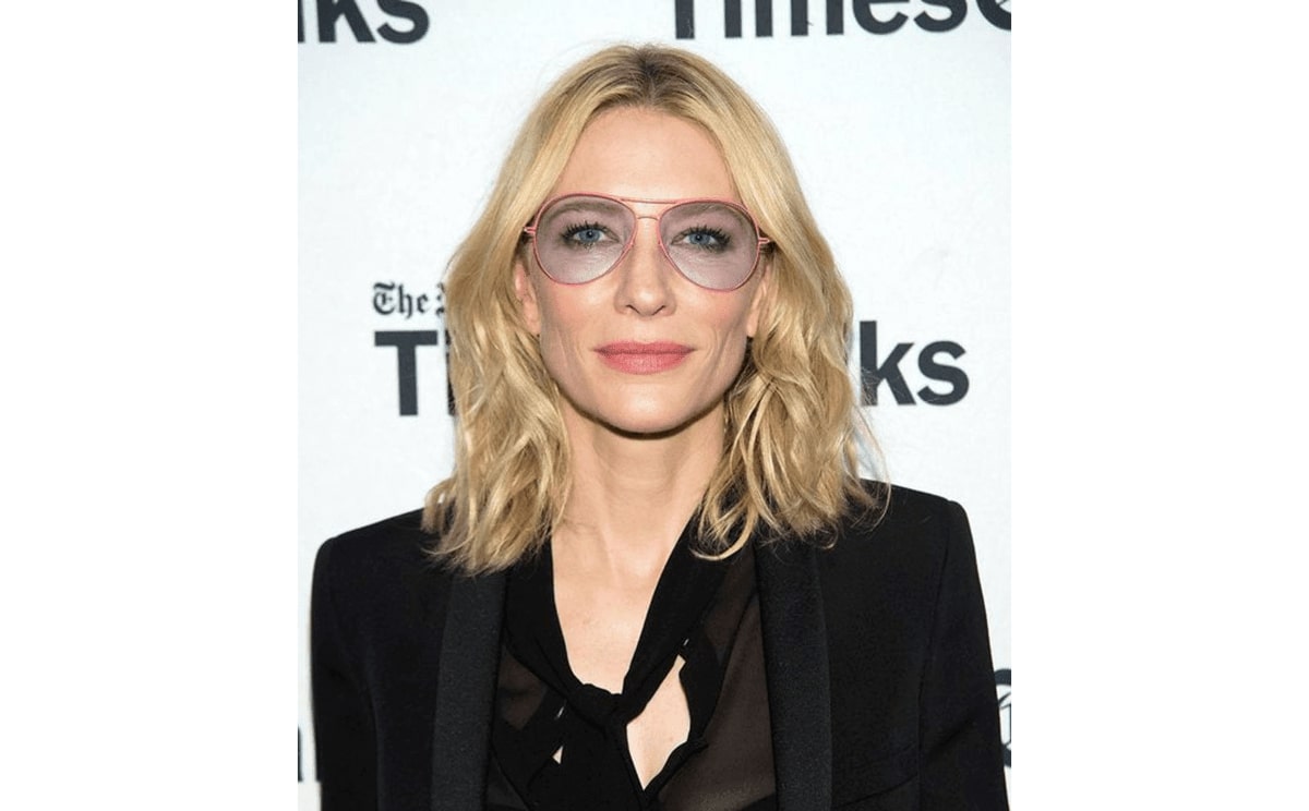 cate blanchett wearing a pair of pink aviators