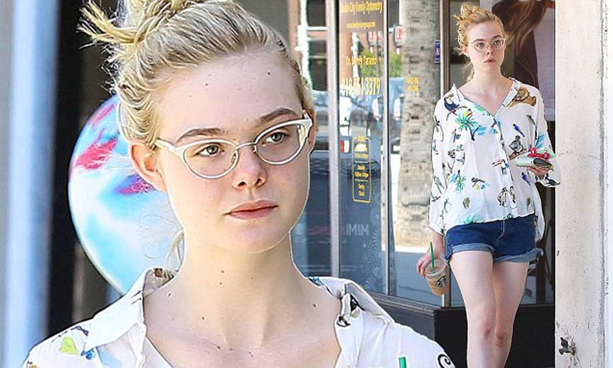 elle fanning wears browline cat eye glasses in animal print shirt