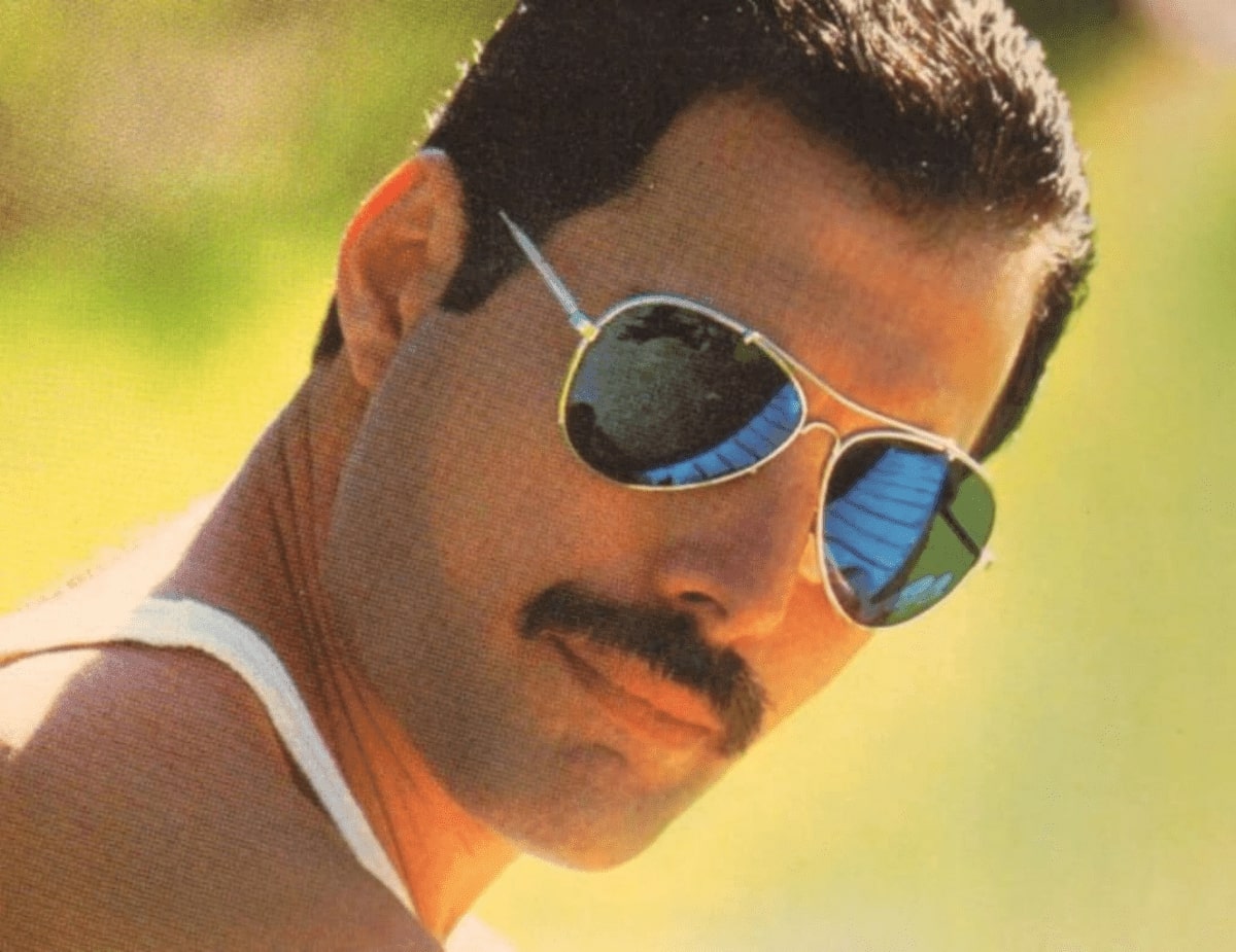 freddie mercury wearing a pair of aviator glasses