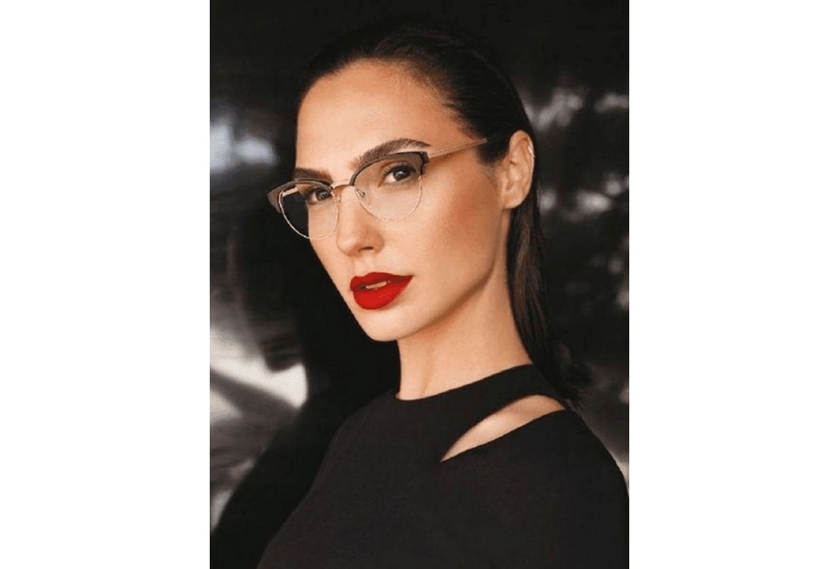 gal gadot wearing a pair of browline glasses