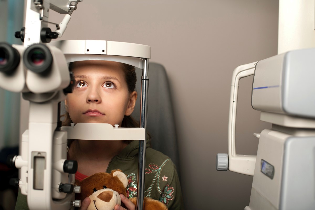 a girl having an eye exam