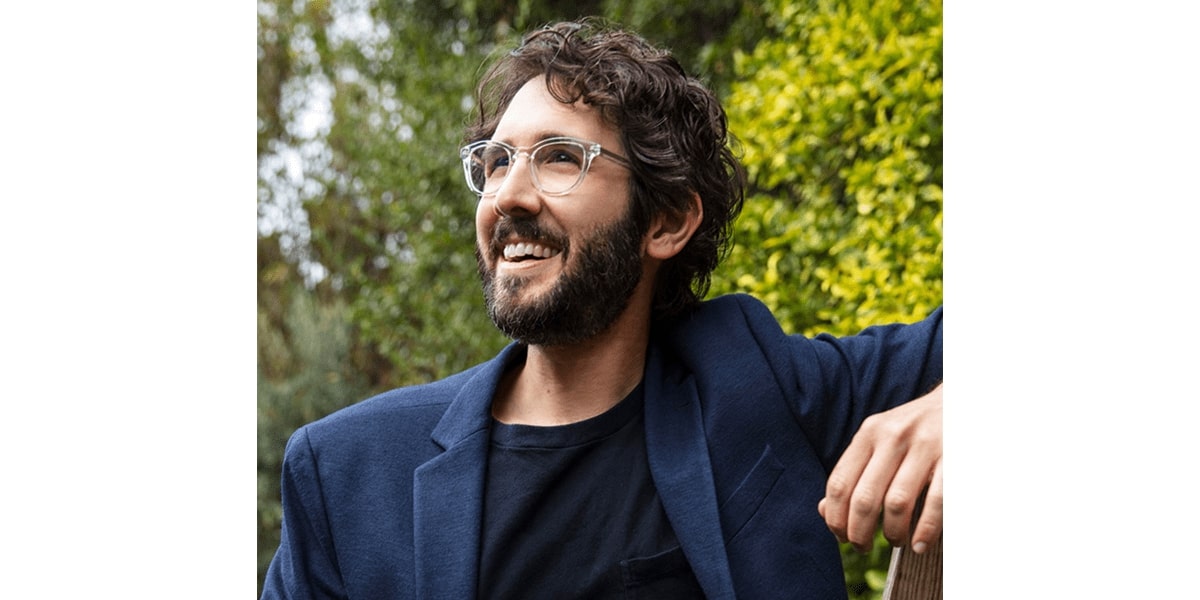 josh groban wearing a pair of clear glasses frame