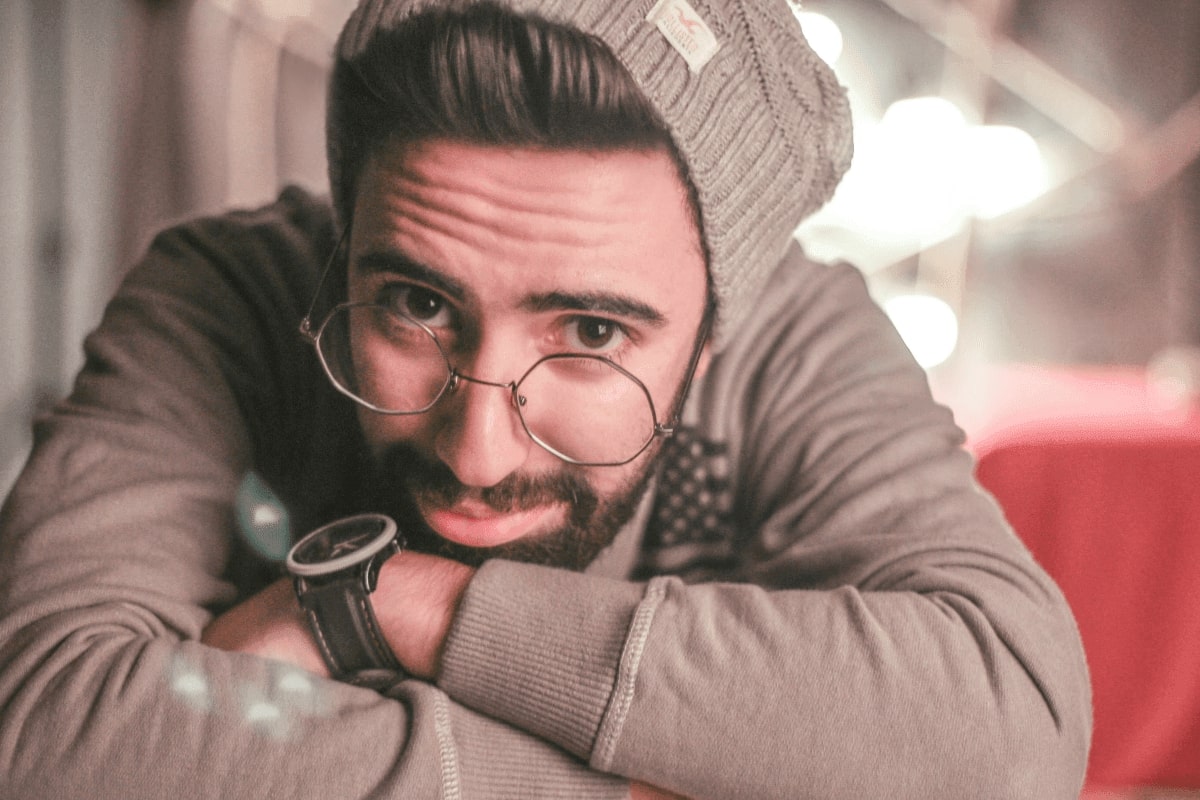 man wearing a pair of thin metal glasses frame