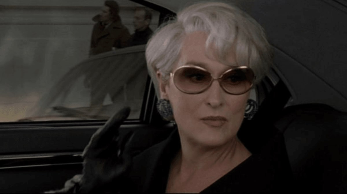 meryl streep with a pair of sunglasses in the movie devil wears prada