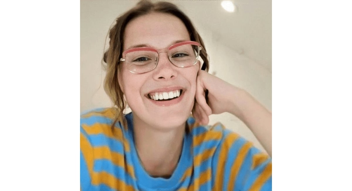 millie bobby brown wearing a pair of pastel glasses