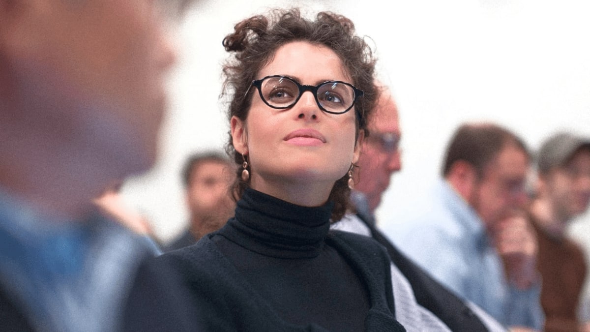 neri oxman wearing a pair of black rimmed oval frame