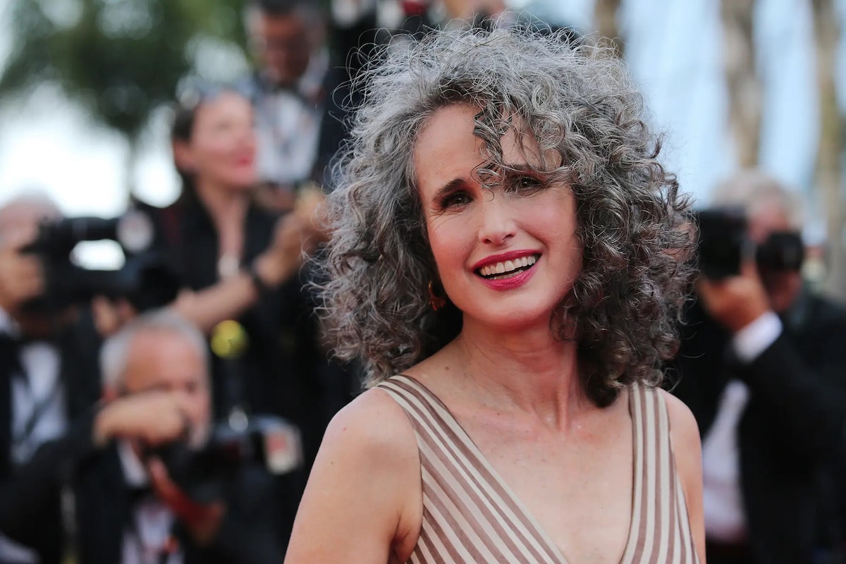 andie macdowell happy wearing gray hair on red carpet 