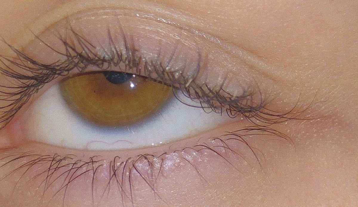 closeup of an eyeball rolling upwards
