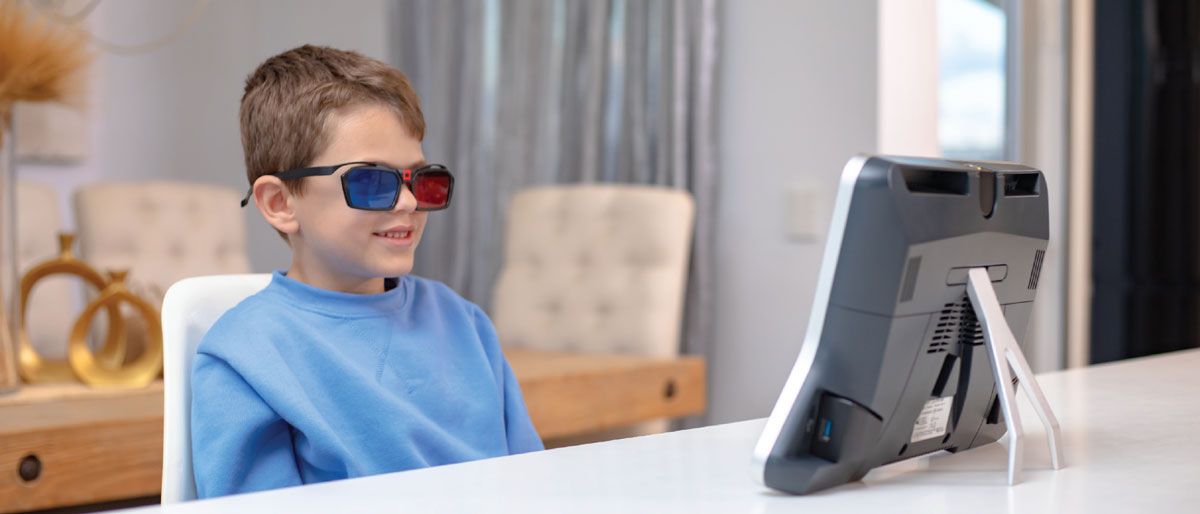 child wearing high-tech glasses to monitor his gaze