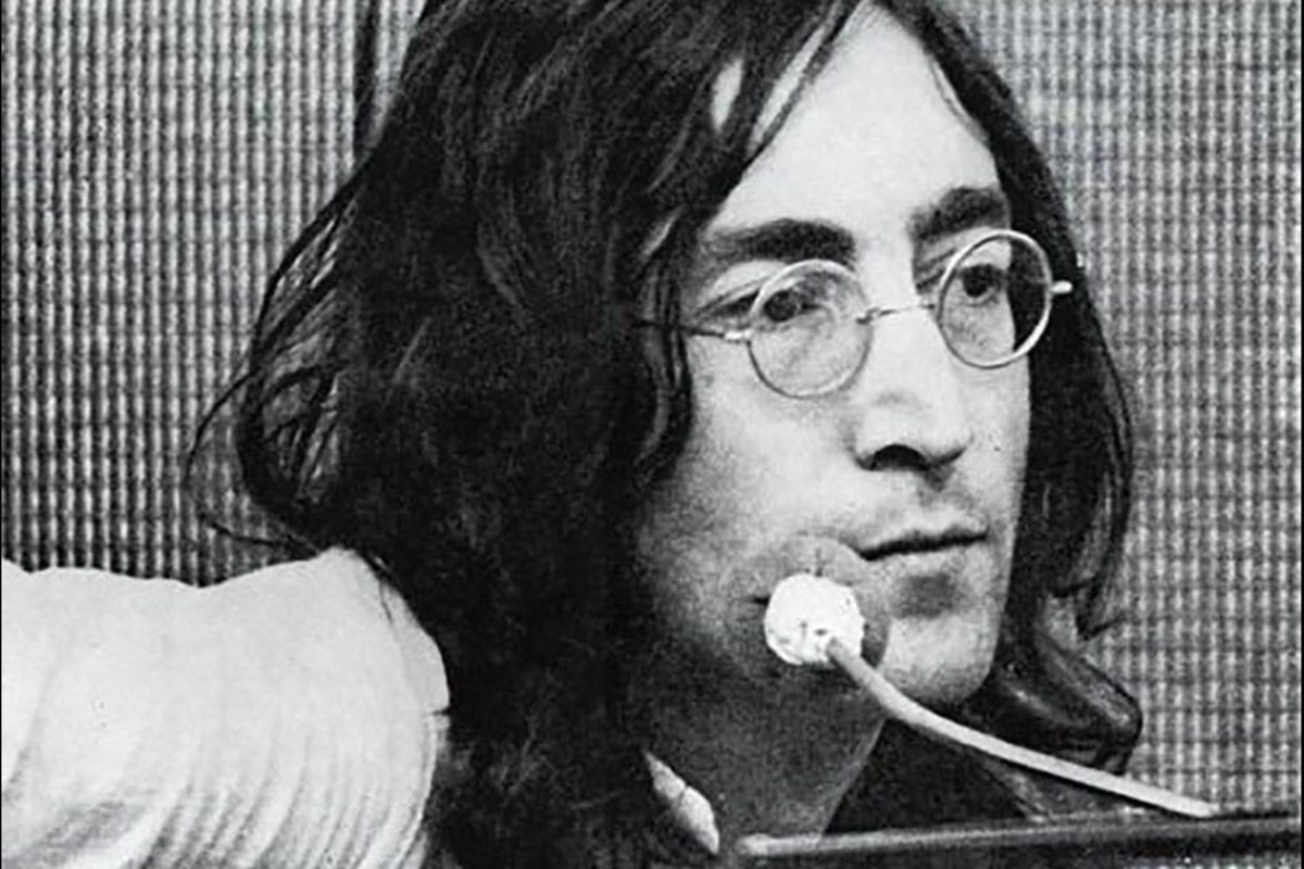 john lennon wearing a pair of small round glasses