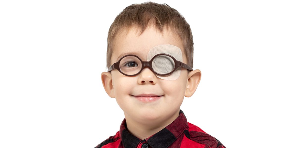 child wearing an eye patch to treat lazy eye