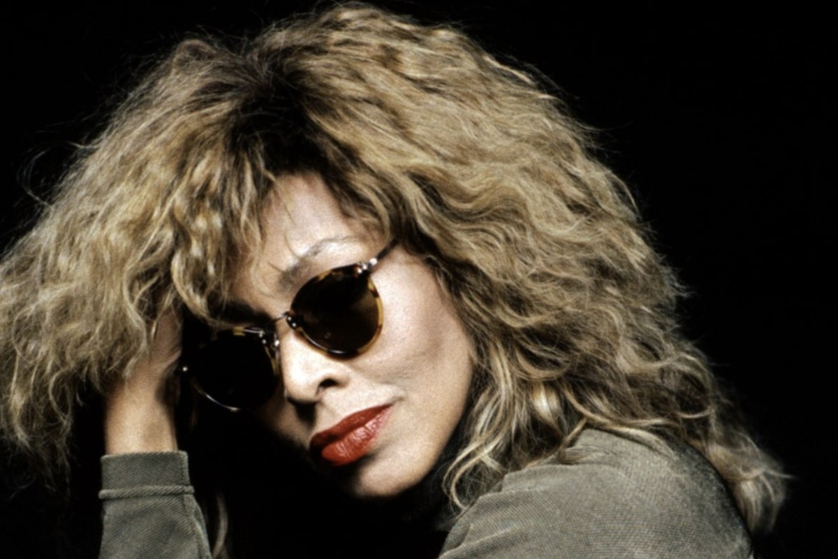 tina turner wearing a pair of square tortoiseshell glasses