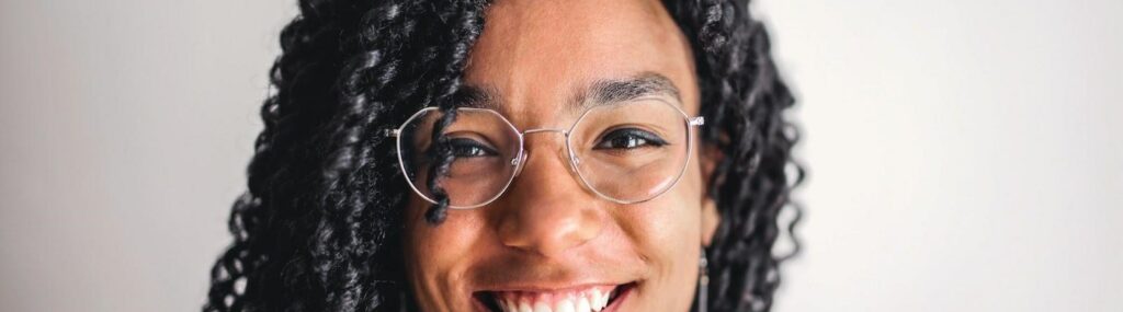 woman wearing a pair of thin glasses frame