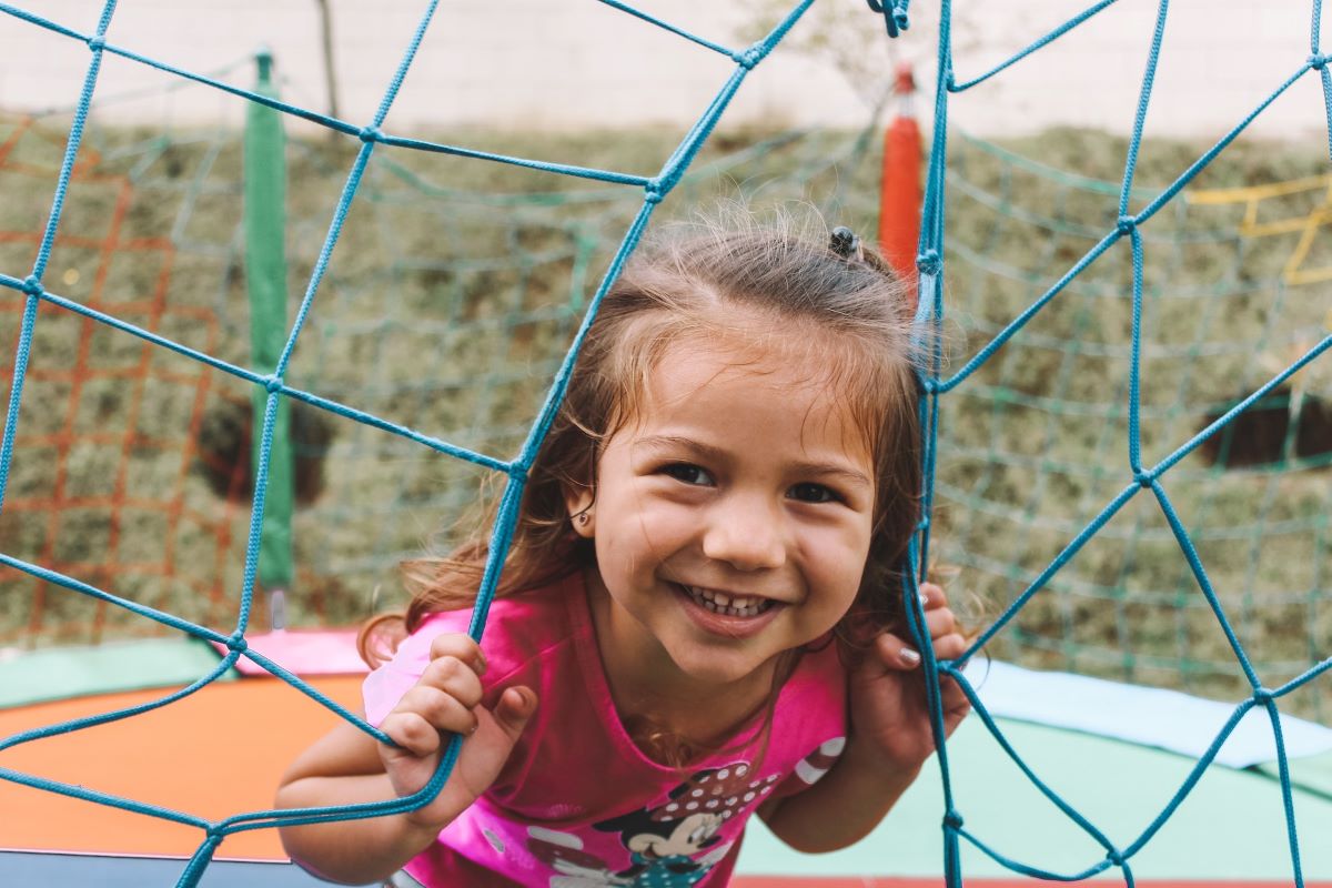 smiling toddler recognizing emotions