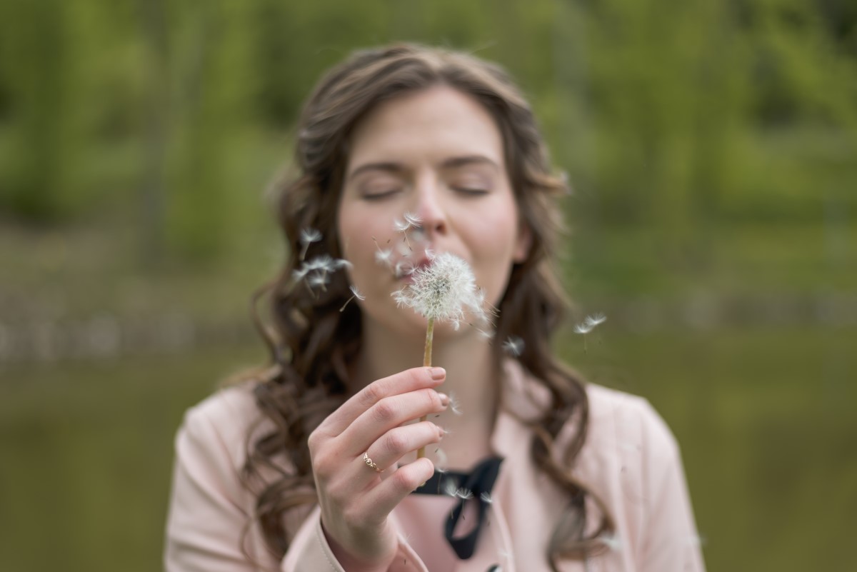 Girl Avoiding Pollen By Closing Her Eyes