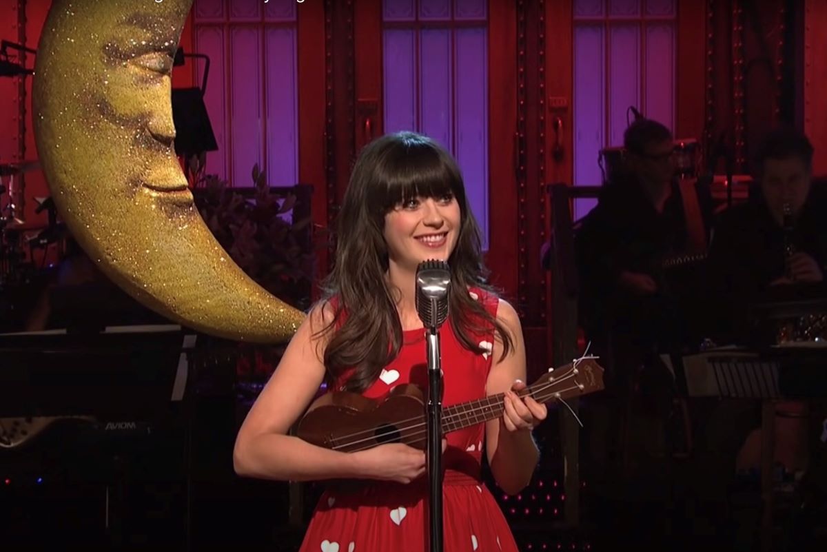 Zooey Deschanel wearing red floral dress