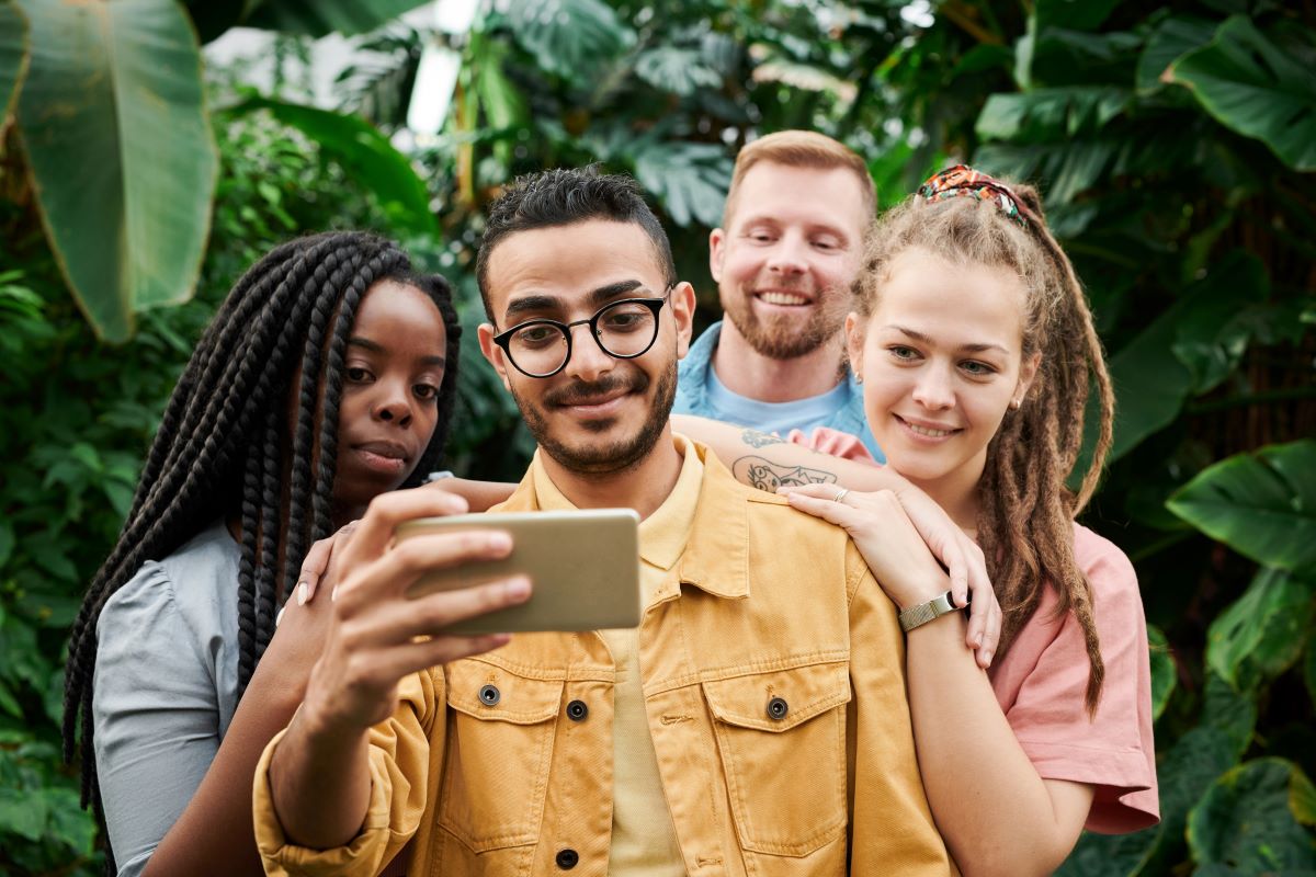 group of people taking selfie