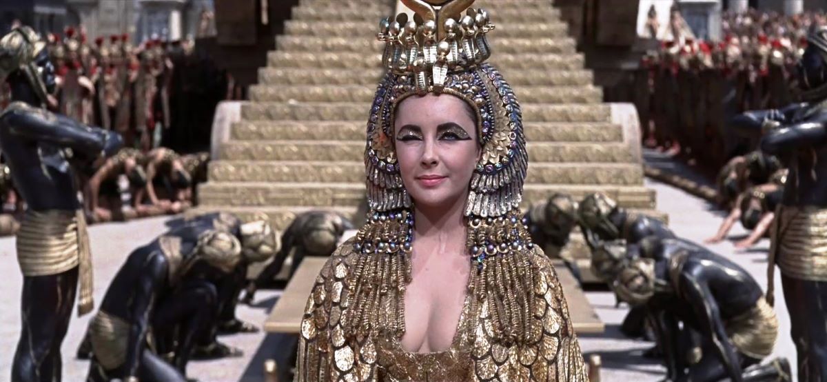 Elizabeth Taylor winking in the movie Cleopatra