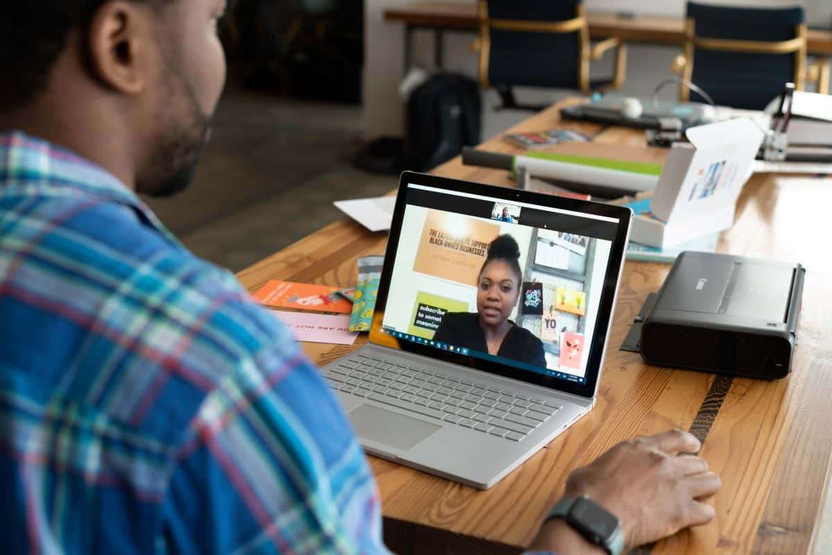 a man and a woman practicing maintaining eye contact via video chats