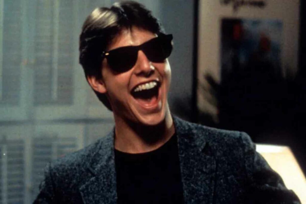 tom cruise wearing a pair of wayfarers in the film risky business