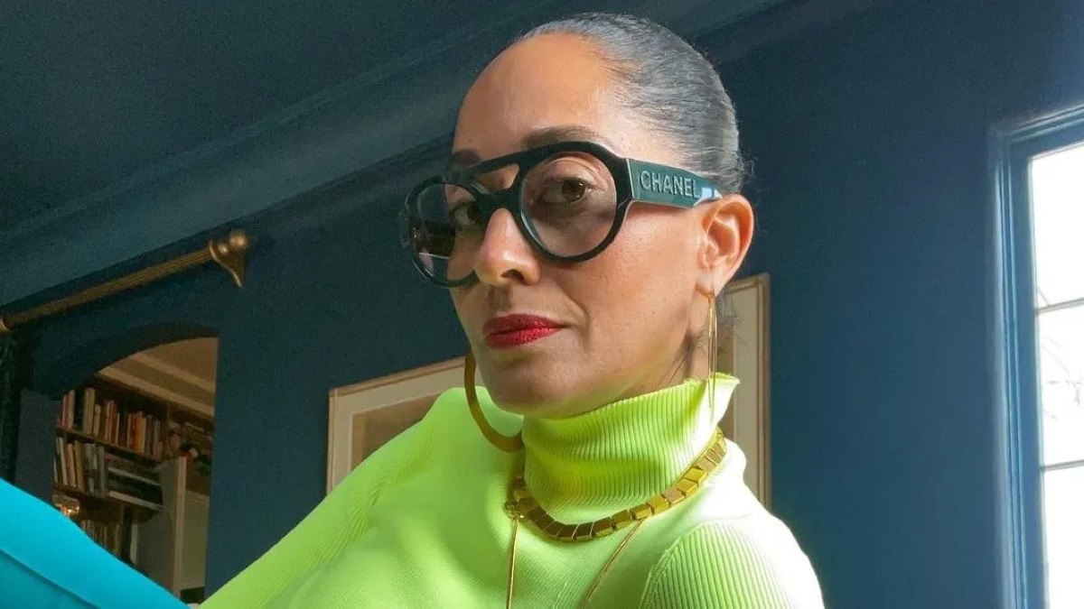 tracee ellis ross wearing a pair of thick round glasses