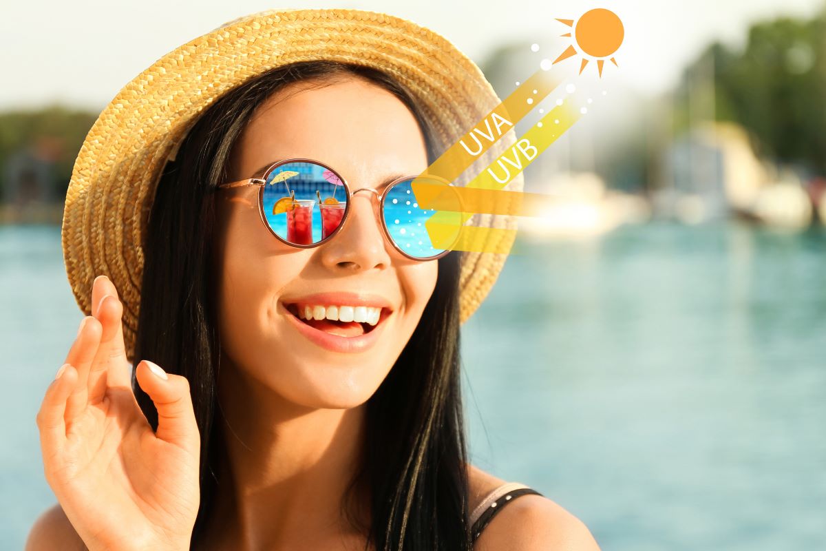 woman wearing glasses with UV protection at the beach