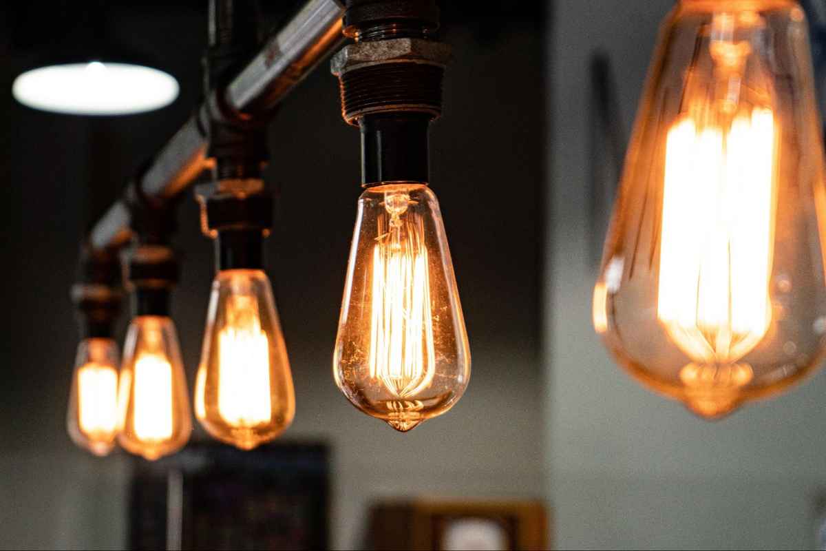 five lit incadescent light bulbs