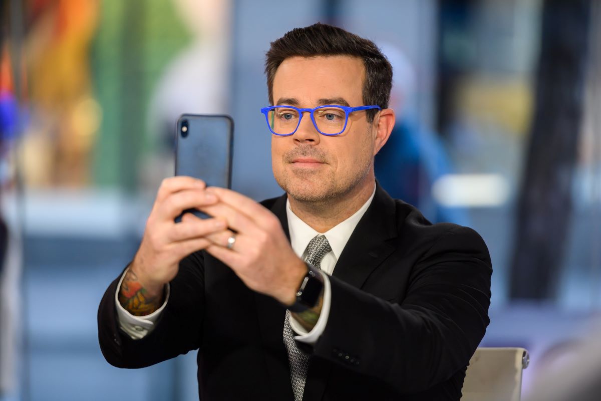 Carson Daly wearing rectangular blue glasses